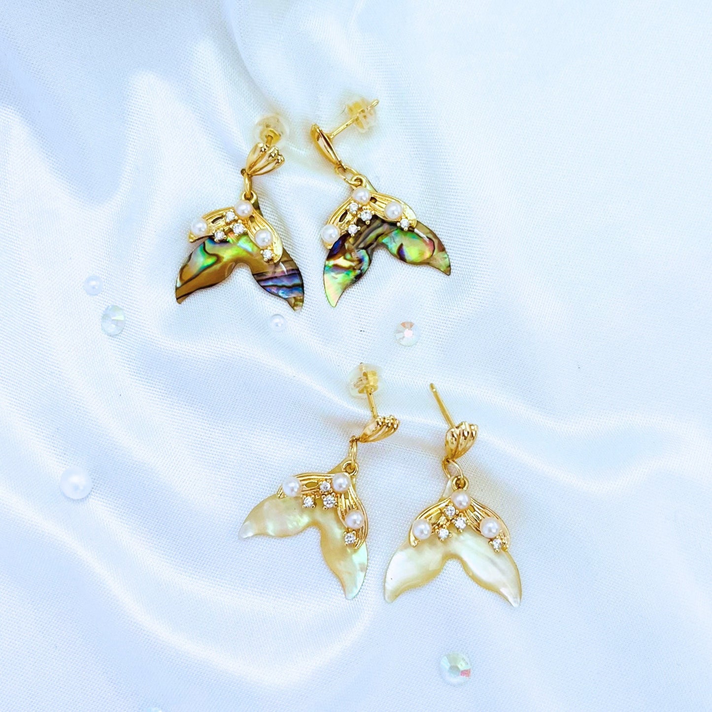 Mermaid Earrings with 2 color designs on a light blue background