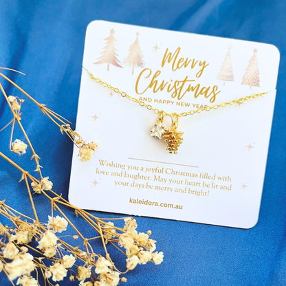 Clear Star Christmas Necklace with Gold Card - Snowflake, Pinecone & Reindeer Charm