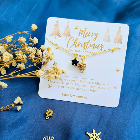 Blue Star Christmas Necklace with Gold Card - Snowflake, Pinecone & Reindeer Charm