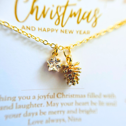 Clear Star Christmas Necklace with Gold Card - Snowflake, Pinecone & Reindeer Charm