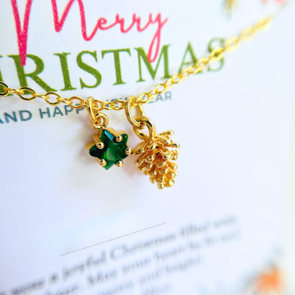 Green Star Christmas Necklace - Snowflake, Pinecone & Reindeer Charm