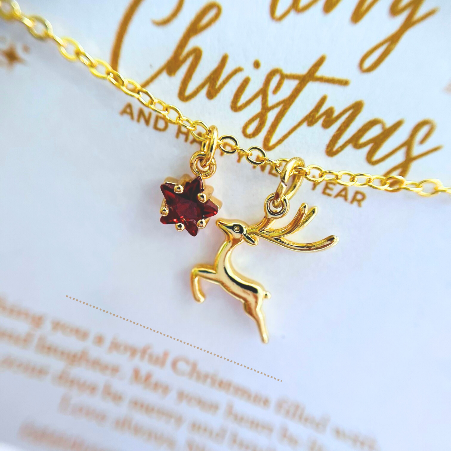 Red Star Christmas Necklace with Gold Card - Snowflake, Pinecone & Reindeer Charm
