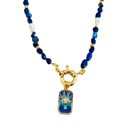 Lapis Lazuli Gemstone Necklace with  Blue Enamel Evil Eye Star Gold Plated Pendant on a white background
