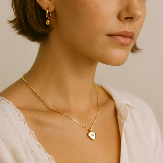 Close-up of a woman wearing a Gold Plated Heart Necklace