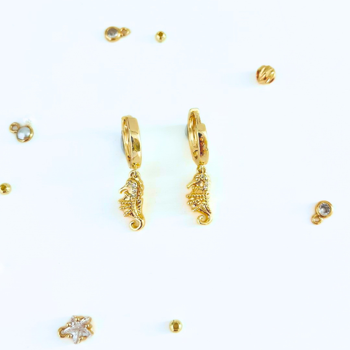 CZ Seahorse Gold Plated Chunky Huggie Hoop Earrings on a white background