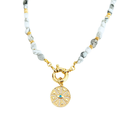 natural howlite gemstone Necklace with CZ Turquoise Evil Eye Symbols Round Pendant on a white background
