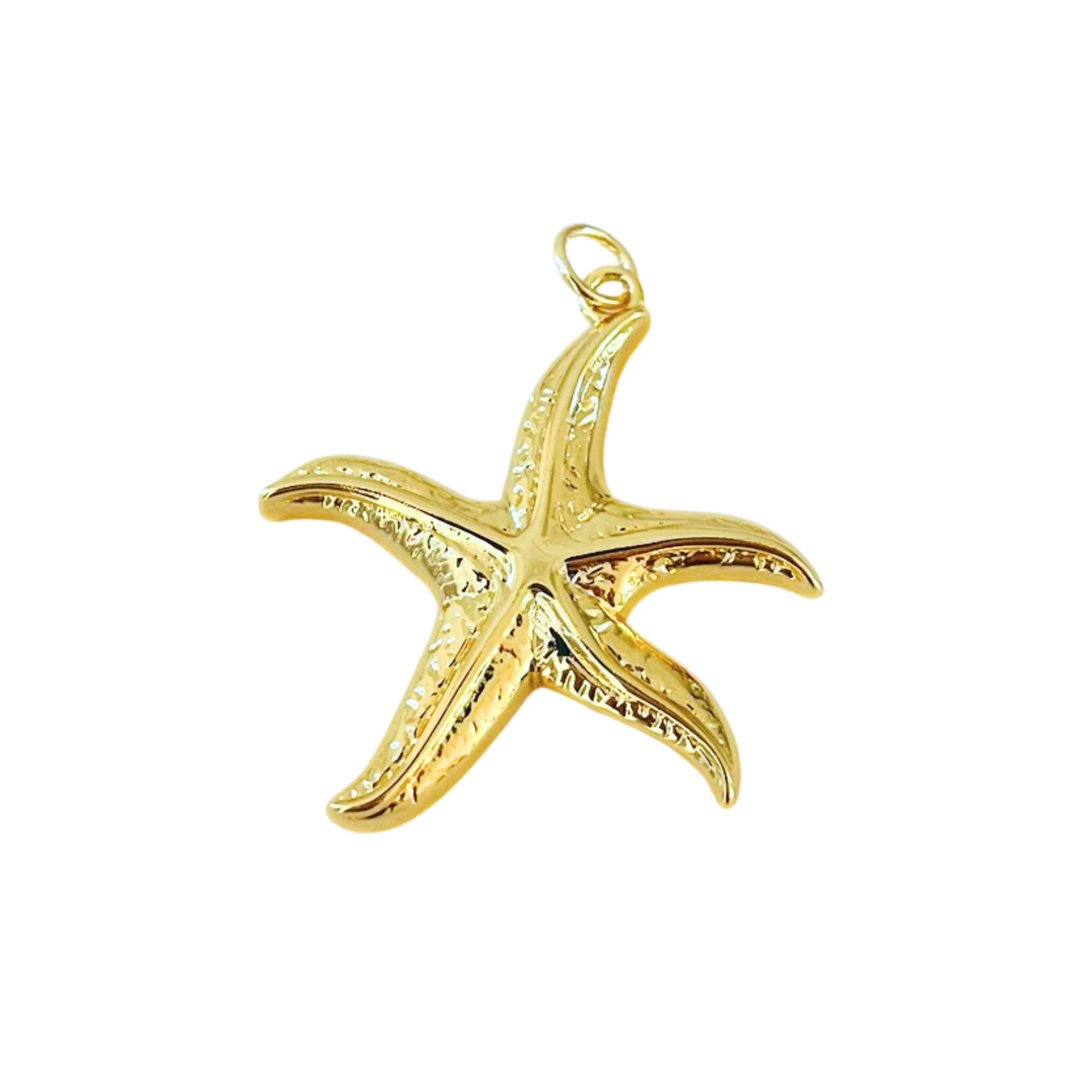 Gold starfish pendant on a white background