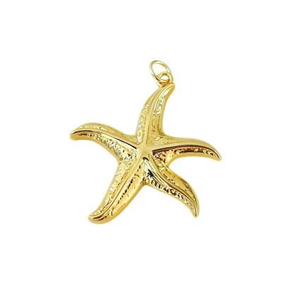 Gold starfish pendant on a white background
