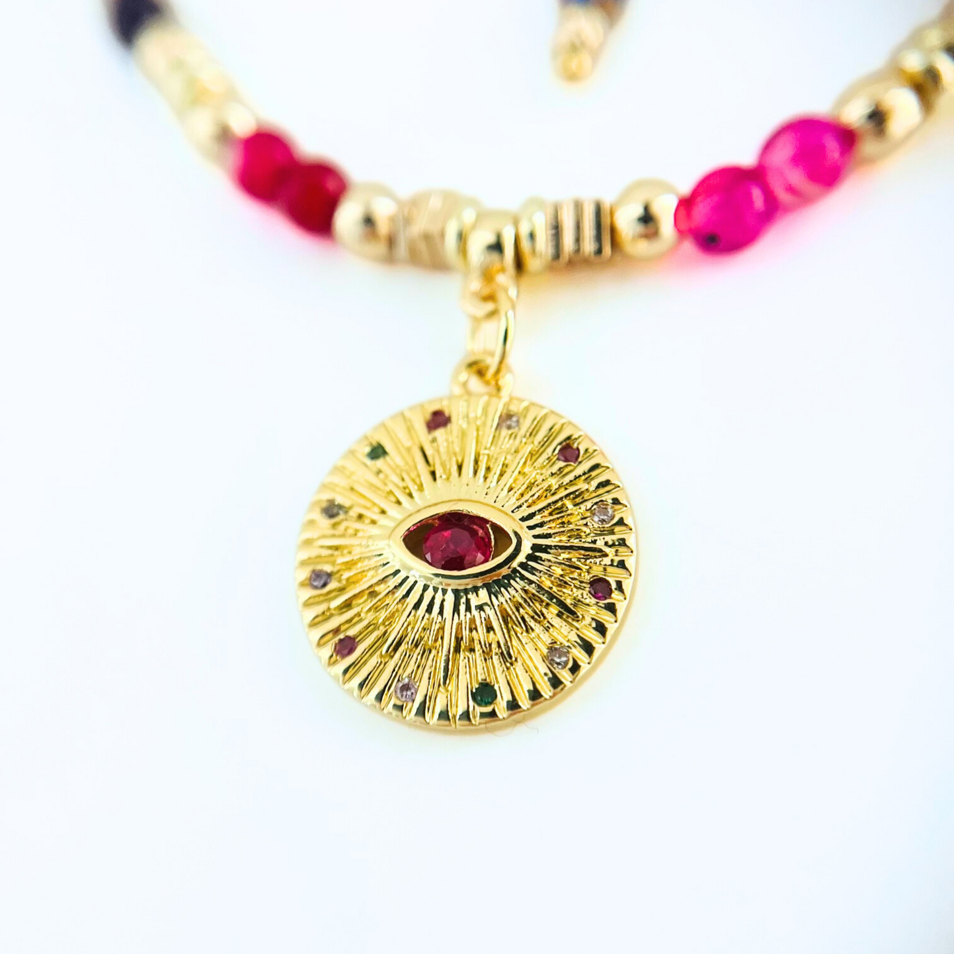 Magenta CZ Evil Eye Pendant Gemstone Necklace
on a white background
