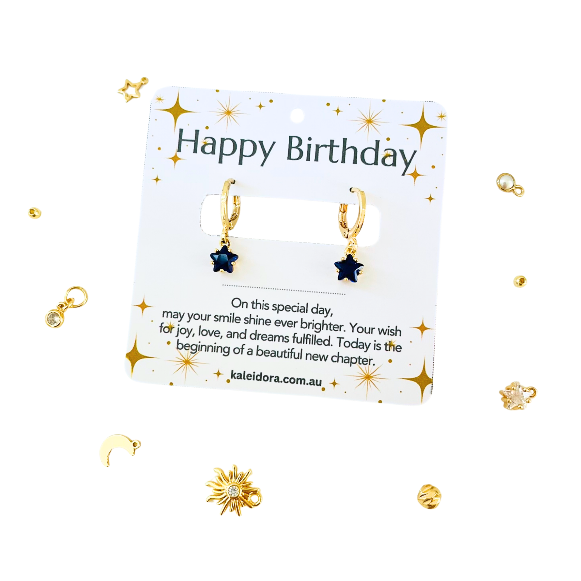 September Birthstone Sapphire CZ Star Hoop Earrings on a 'Happy Birthday' card on a light  background