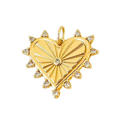 Gold heart-shaped pendant with clear CZ accents on a white background