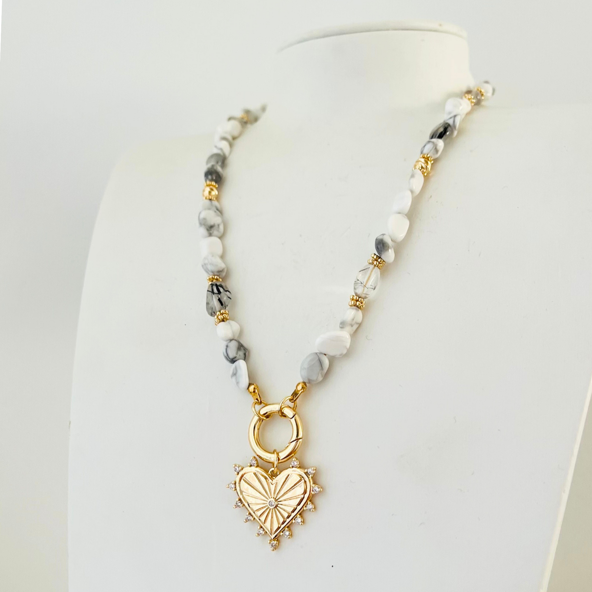 Natural Howlite Necklace with heart-shaped pendant on a mannequin 