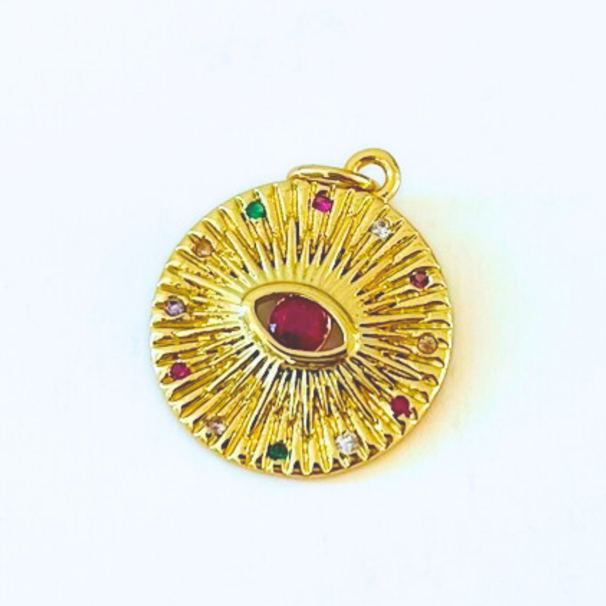 Magenta CZ Evil Eye Gold Plated Round Pendant on a white background