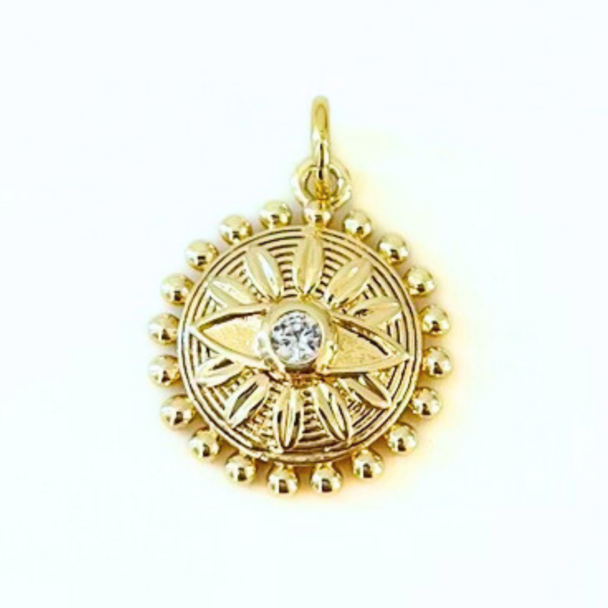Gold Plated Sunburst CZ Evil Eye Pendant on a white background