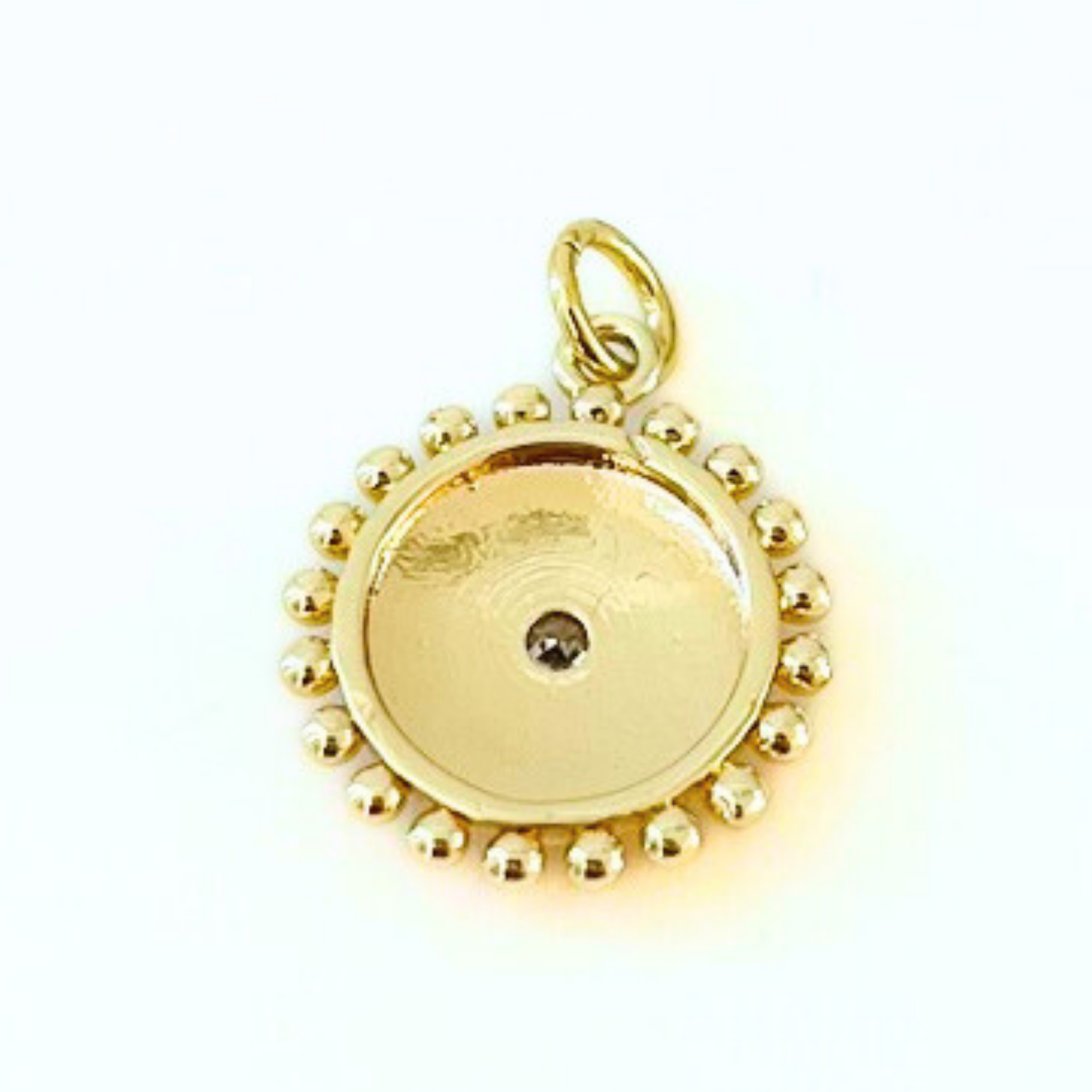 Gold Plated Sunburst Evil Eye Pendant back on a white background