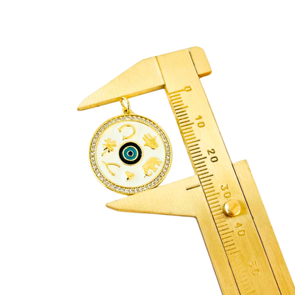 Gold Plated Symbols Medallion Pendant held by a gold caliper on a white background