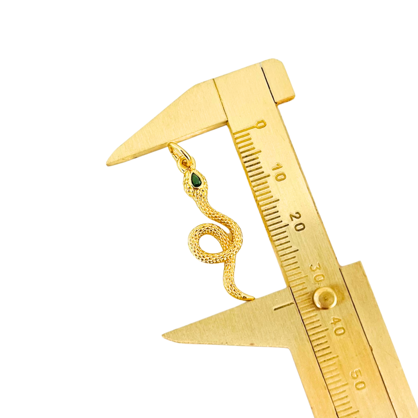 Green CZ Eyes Gold Plated Snake Pendant being measured by a gold caliper on a white background
