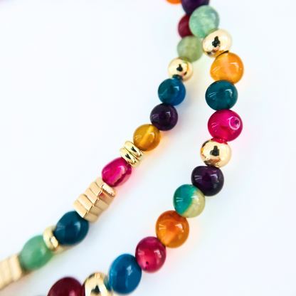 Handmade Colorful Agate necklace with gold accents on a white background