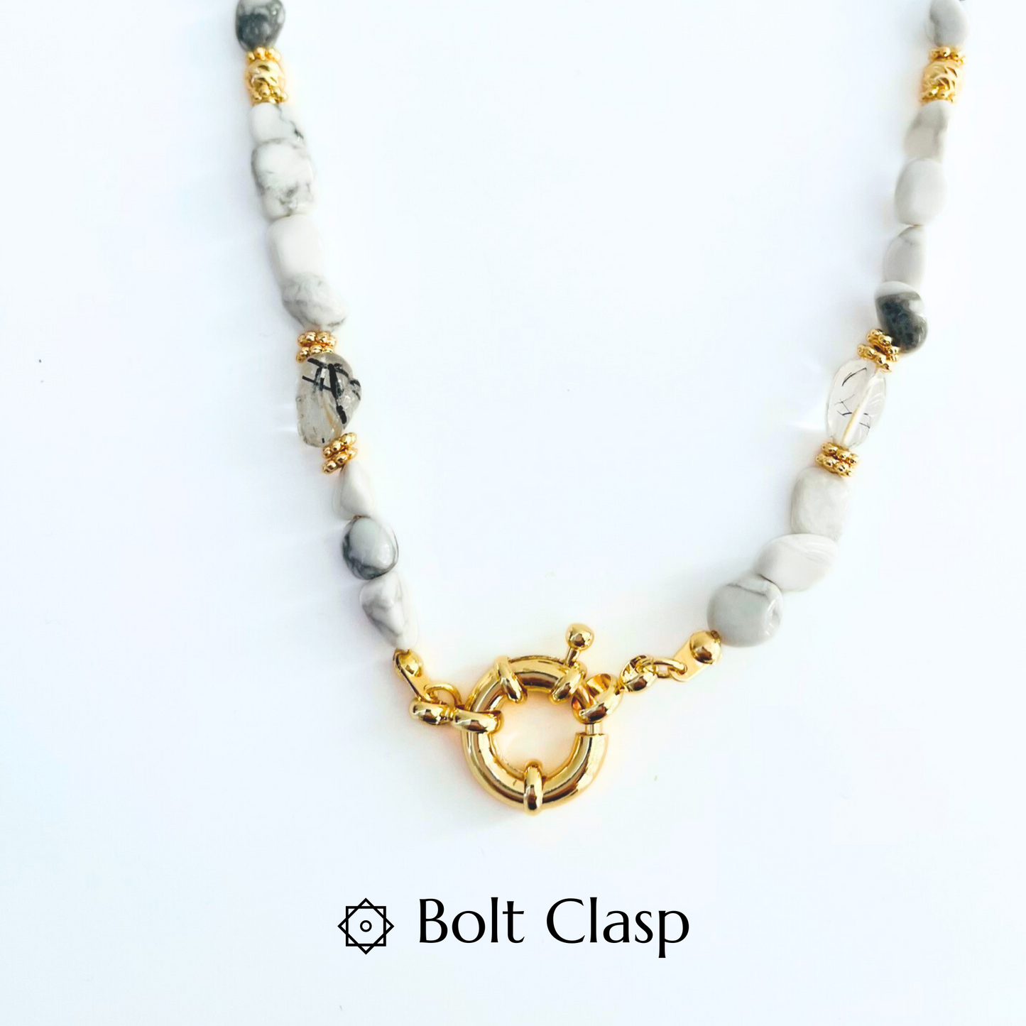 natural Howlite Gemstone Necklace with a gold bolt clasp on a white background