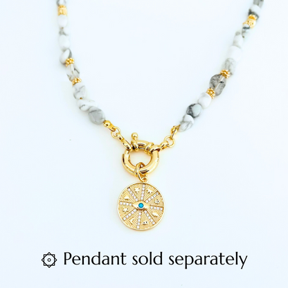 Natural Howlite Gemtsone Necklace with gold plated bolt clasp and CZ Turquoise Evil Eye Symbols Round pendant on a white background, with text 'Pendant sold separately'.