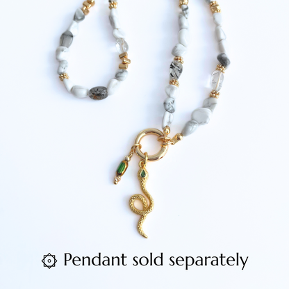 Natural Howlite Gemtsone Necklace with gold plated Canariner Clasp and Snake Pendant on a white background, with text 'Pendant sold separately'.