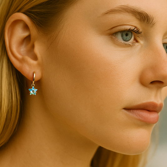 Close-up of a woman wearing a star-shaped earring with a blurred background
