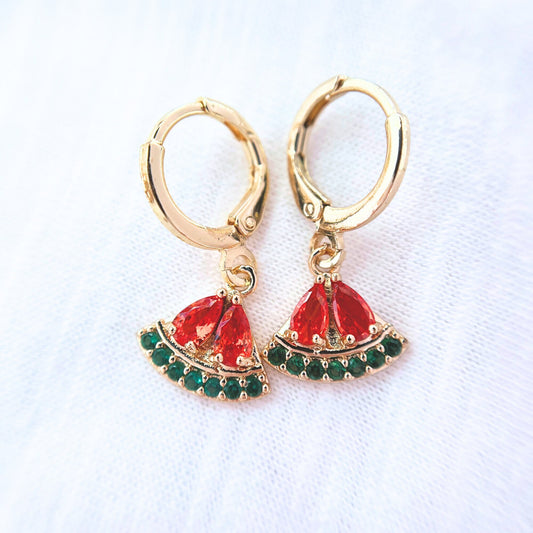 14K Gold-filled fruit earrings. The red and green zircon looks shining on the watermelon charm. These watermelon pendant earrings are designed with fruit charms that exude elegance and playfulness. For daughter present, plant mom gift.
