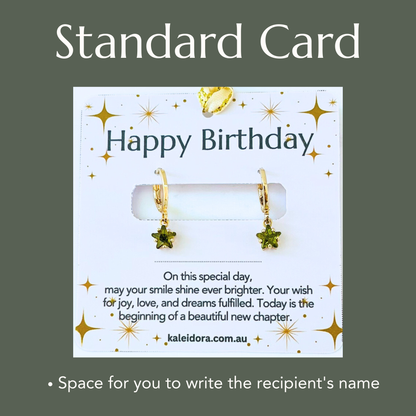 standard Birthday card with gold earrings on a white background